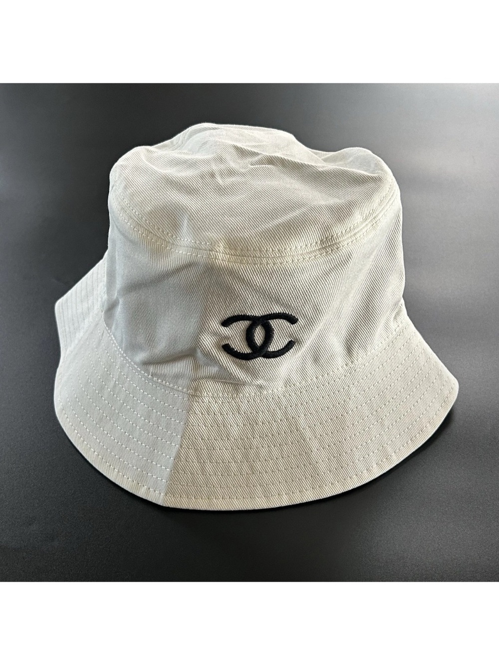 CHANEL Cream Bucket Hat with Black CC Logo